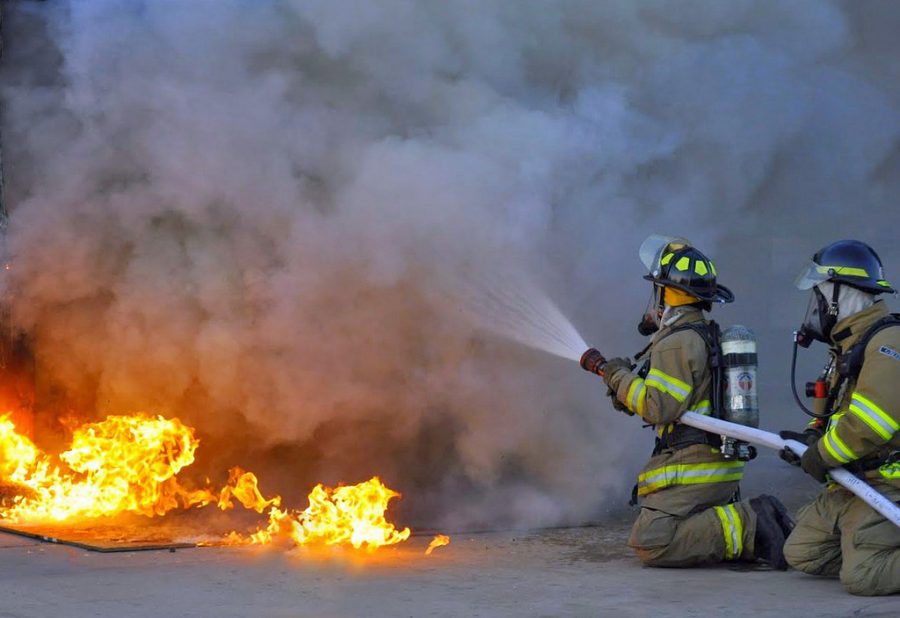 Firefighters putting out fire