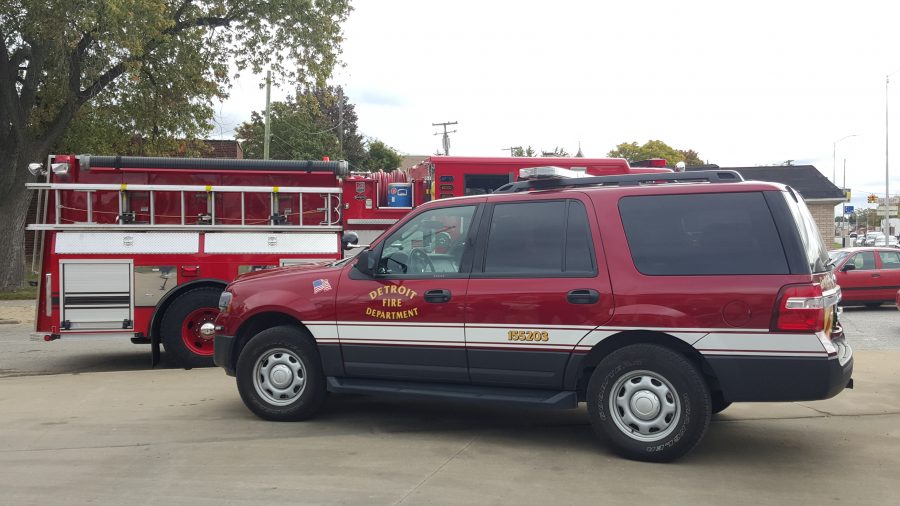 Detroit fire truck and support vehicles on scene