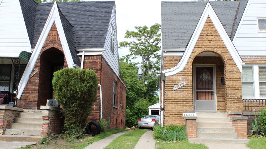 Two modest Detroit homes next to each other on a Detroit street.