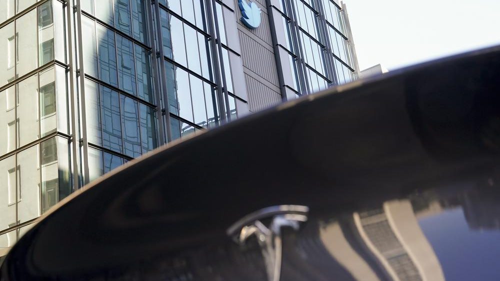 Tesla vehicle parked outside Twitter's headquarters.