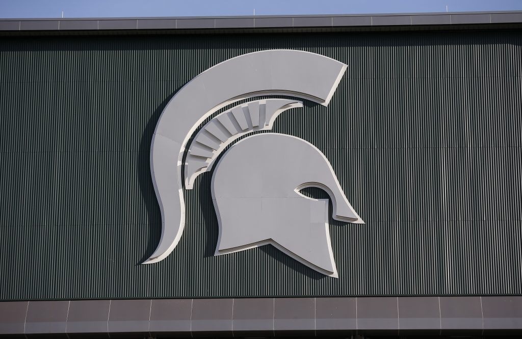 Michigan State's logo is seen on Spartan Stadium in East Lansing, Aug. 30, 2019.