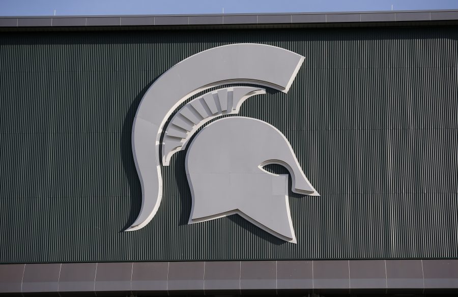 Michigan State's logo is seen on Spartan Stadium in East Lansing, Aug. 30, 2019.