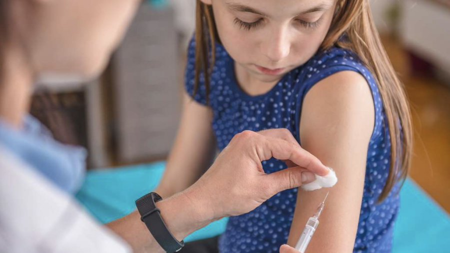 A child receives a vaccination