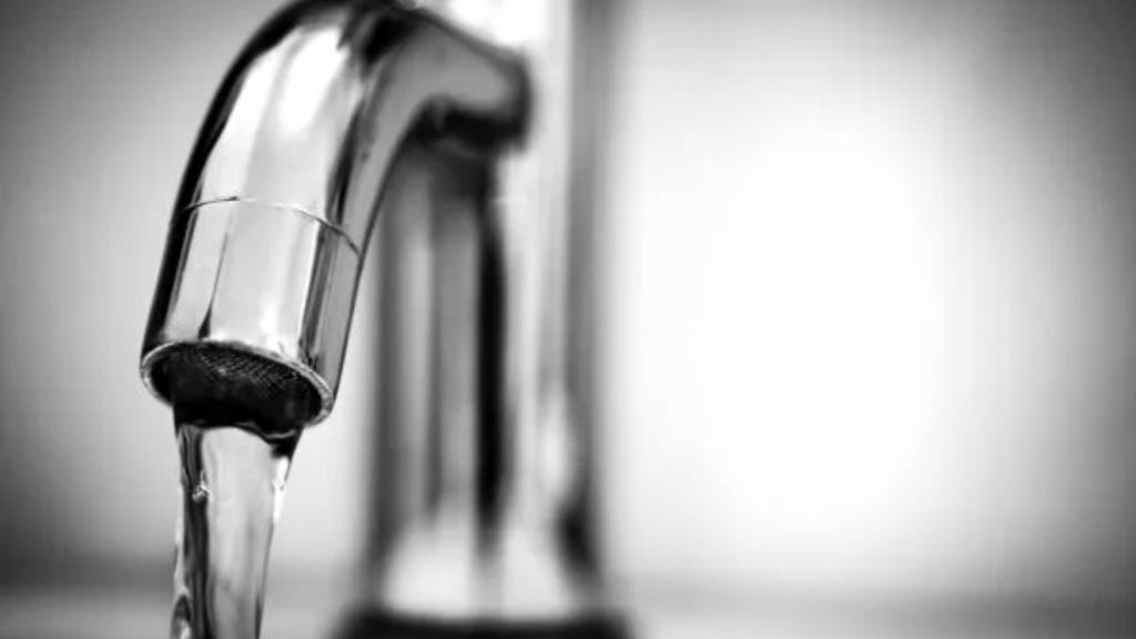 water coming out of a faucet