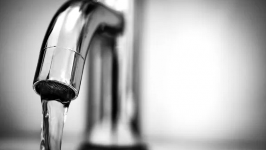 water coming out of a faucet